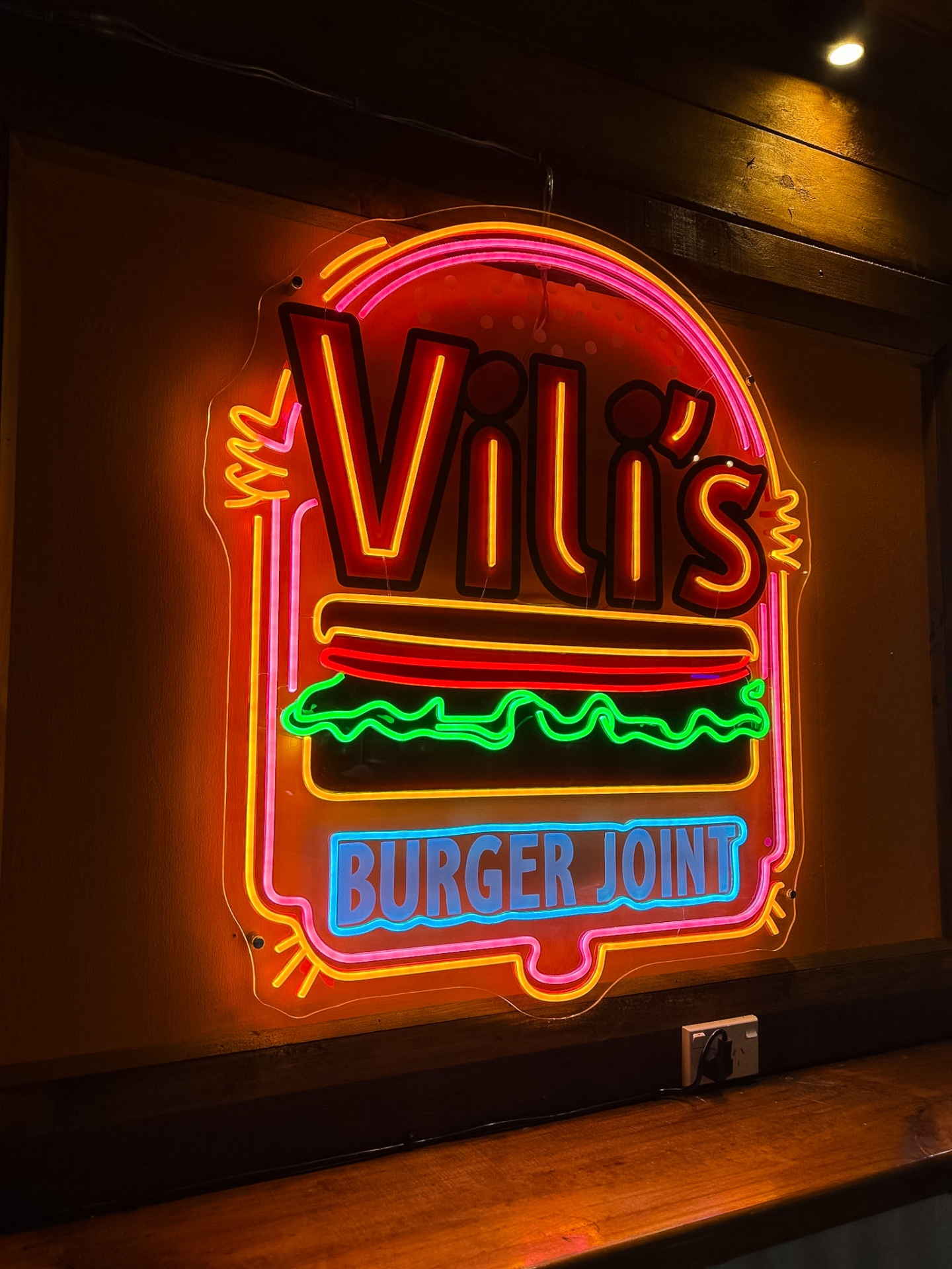 Colourful Vili's Burger Joint neon sign